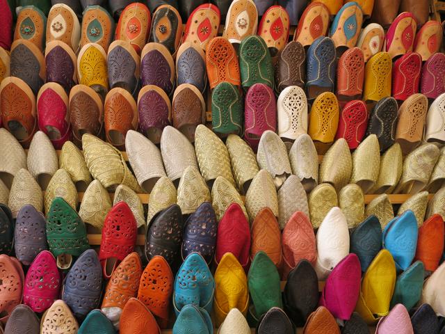 Traditional Moroccan shoes called babouches on sale at a market in Fez